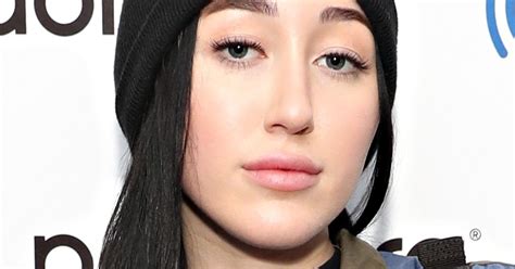 noah cyrus puts on an eye popping display as she goes topless beneath sheer white lace dress for