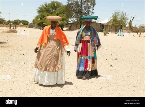 Two Women In Traditional Dress Sehitwa Botswana Africa Stock Photo