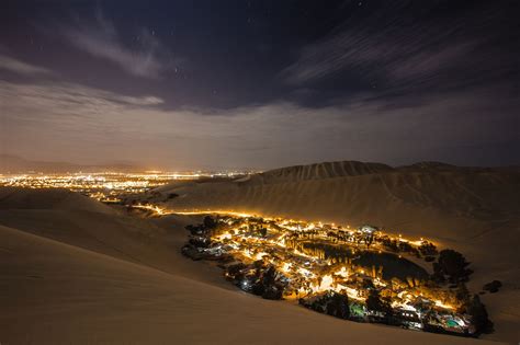 Oasis The Huacachina Oasis Is Nestled Into The Sand Dunes Of Ica