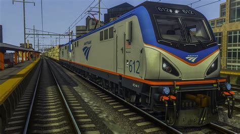 Tsc Amtk Acs 64s Pull A Long Freight Train Through New Brunswick