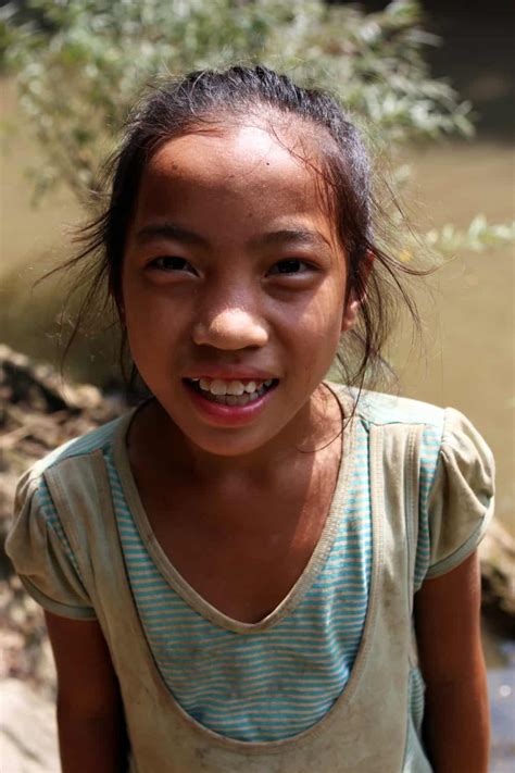 Two pretty playful young girls. A young girl in Laos - Stray Asia - Southeast Asia ...