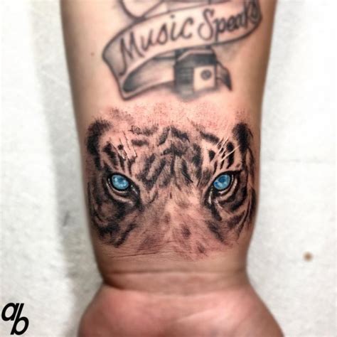 White Tiger Eyes Tattoo