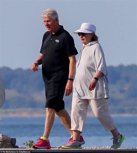 bill and hillary clinton go for a beachside stroll in the hamptons daily mail online