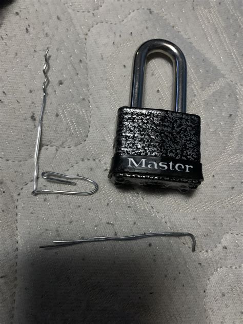 You will be inserting the straight part into the lock to use as a pick. How To Pick A Pad Lock With A Paper Clip - Open A Padlock ...