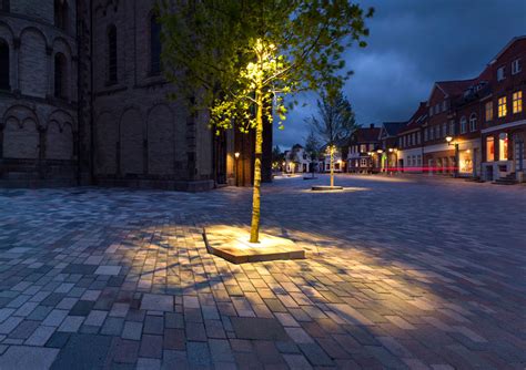 Textured architectural landscape path lighting. Ribe-Cathedral-Square-by-Schonherr-Landscape_Architecture ...