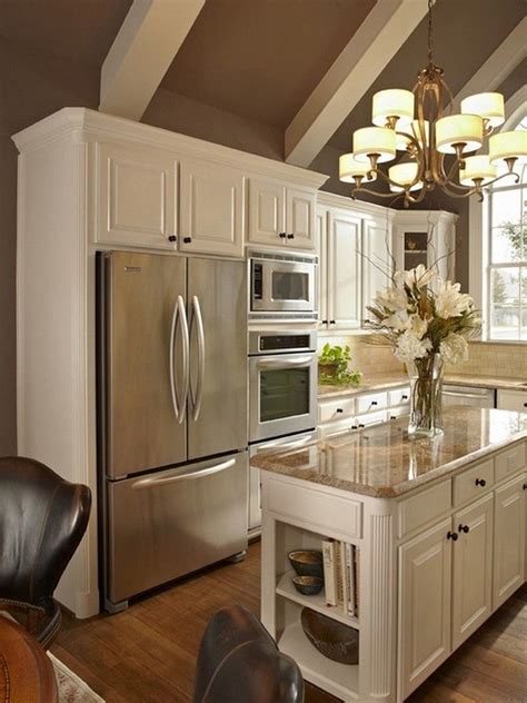 The model boasted a gray kitchen with adjacent light cream beverage center. 120+ Easy And Elegant Cream Colored Kitchen Cabinets ...