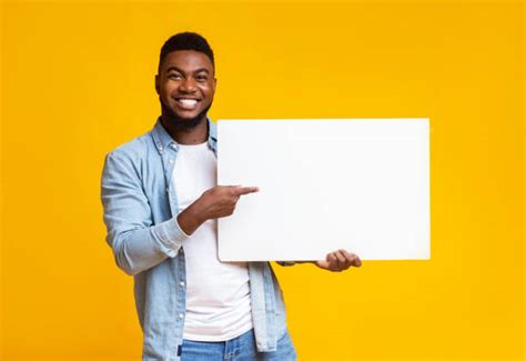 246200 Guy Holding Sign Stock Photos Pictures And Royalty Free Images