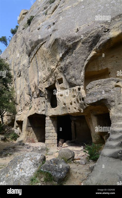 Troglodyte Houses Or Cave Dwellings Cut Out Of The Cliff Face At The