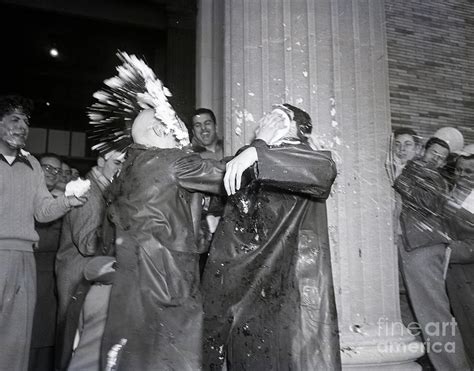 Men Hit Each Other With Pies In The Face By Bettmann
