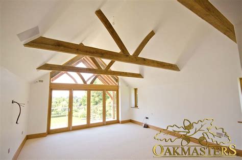 These ceiling truss system are sure to grab attention. King post trusses and open vaulted ceilings - Oakmasters