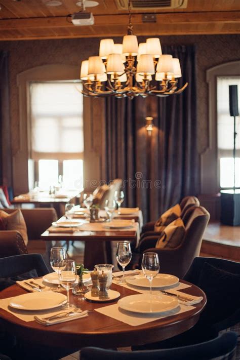 Wooden Design In Classic Restaurant With Glasses On Table Stock Image