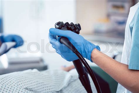 Doctor Holding Endoscope During Colonoscopy Stock Image Colourbox