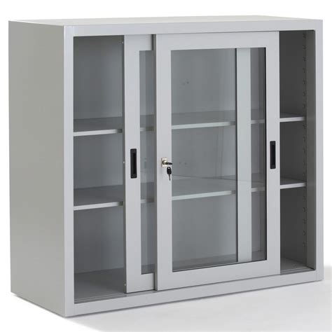 Armoire basse en métal 2 portes coulissantes, 2 étagères en métal, clé non fournie. Armoire métallique porte coulissante transparente - Gosto