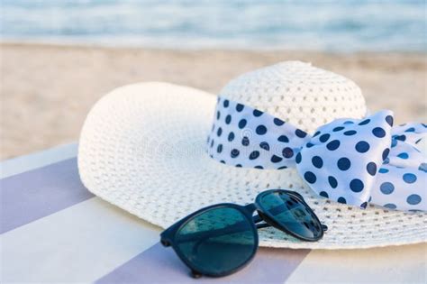 Hat And Sunglasses On The Beach Stock Photo Image Of Holiday