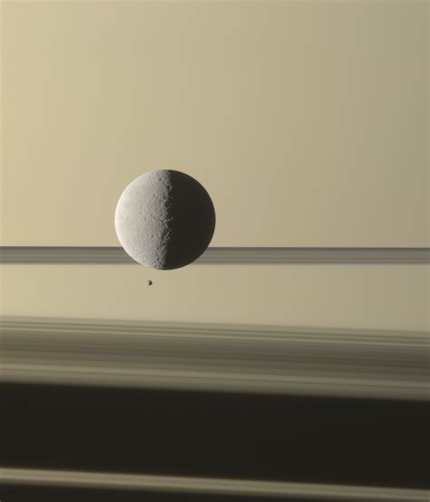 Saturns Moon Rhea Space Sparklings