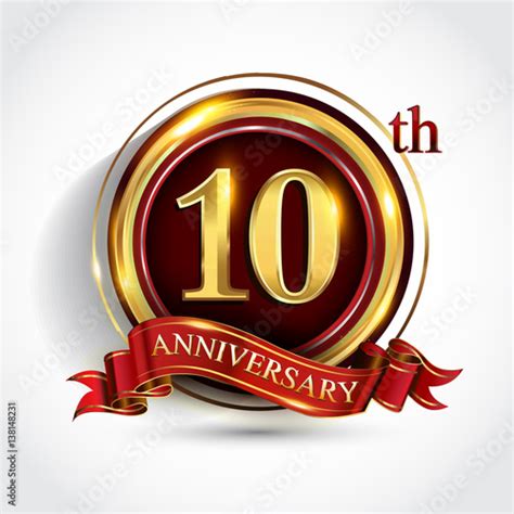 10th Anniversary Logo With Ring And Ribbon Golden Colored Isolated On