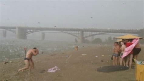 Summer In Siberia Watch Freak Hailstorm Interrupt Sunbathers On