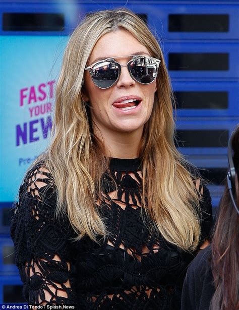 Abbey Clancy Looks Sensational In Black Mesh Dress As She Shoots Scenes During Lfw For