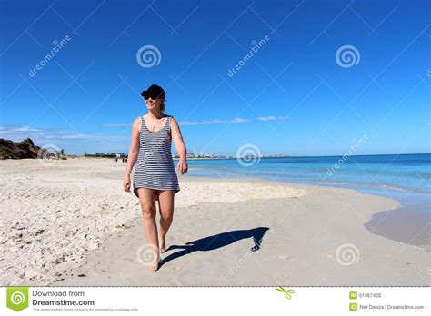 Women Taking A Morning Stroll Down Port Beach Stock Photo Image Of