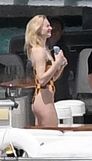 Sophie Turner Highlights Her Slender Figure In A Yellow Checkered Swimsuit In Miami Daily Mail