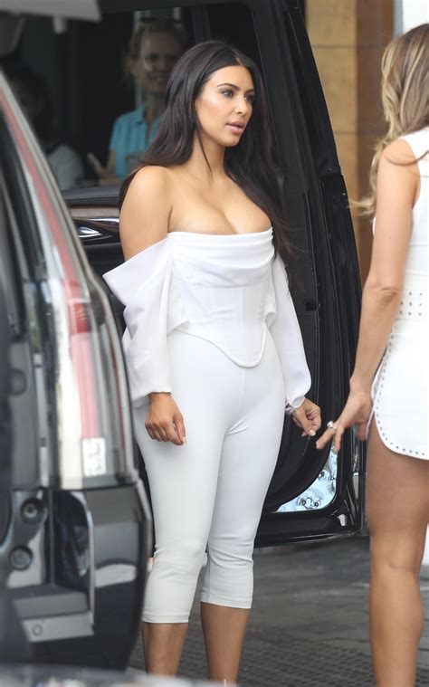 kim kardashian s boobs spill out of corset top in miami