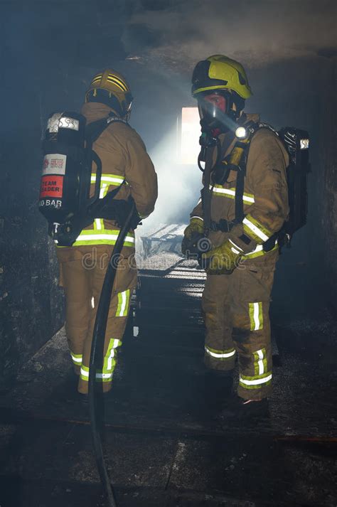 Firefighters In A Smoke Filled Building Editorial Stock Photo Image