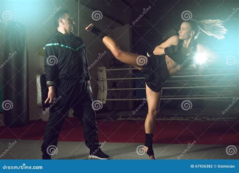 Girl Kicking Back Leg During Kickboxing Practice Stock Photo Image Of