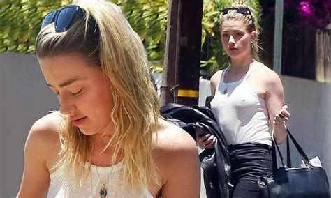 Amber Heard Beats The Heat By Going Braless In Sheer White Tank Top As
