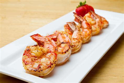 Skewer the shrimp on to soaked wooden skewers. Grilled Jumbo Shrimp Recipe