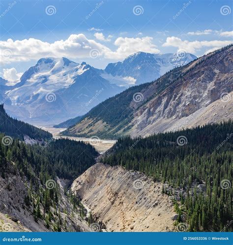 Scenic View Of A Valley Surrounded By Mountains Stock Photo Image Of