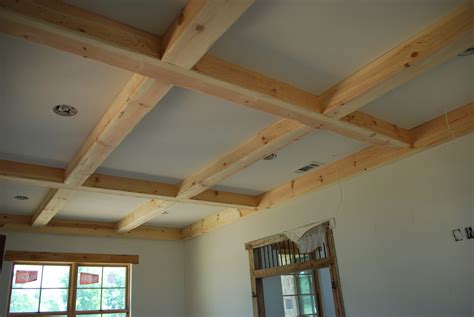 Exposed ceiling beams are an architectural feature that allows rooms to have higher ceilings or a decorative element that adds charm. Lake and Garden: Wood Craft: Ceiling Beams & Cabinets