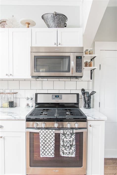 Update your kitchen storage with stock cabinets at lowe's. Lowe's Stock Cabinets Review | Diamond Now Arcadia White Shaker Cabinets — Elizabeth Bur… in ...
