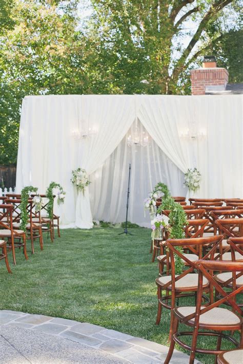 Planning a wedding can feel like a daunting task at the start, but surrounding yourself with an experienced team can take the pressure off your hands and make the process fun and easy. Classic Backyard Wedding from onelove photography ...