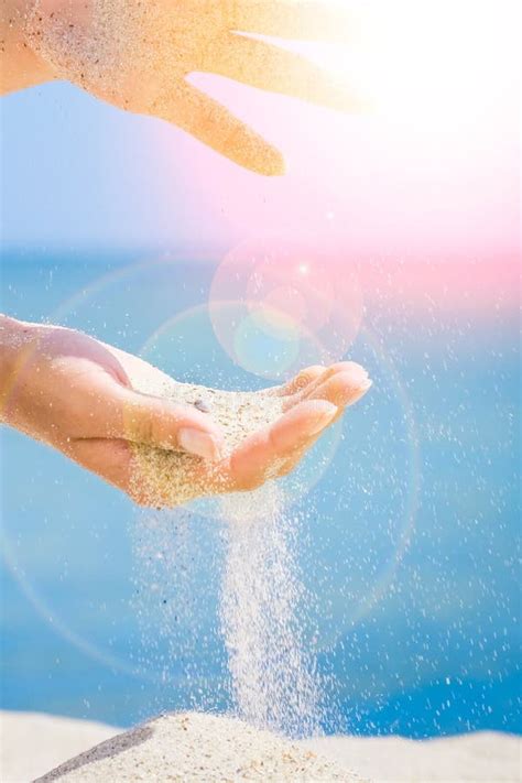 Hands Are Pouring Sand By The Sea Stock Photo Image Of Fingers