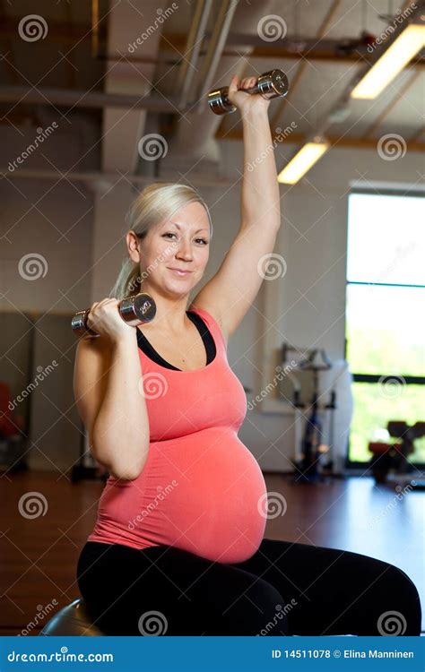 Pregnant Woman Exercising With Weights Stock Photo Image Of Mother