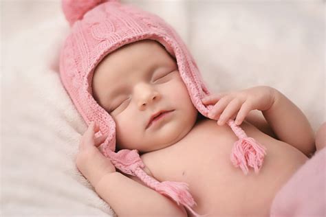 Download Very Cute Baby Pink Knitted Hat Wallpaper