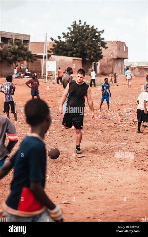 Mali Africa Black African Children Playing Soccer With Caucasian