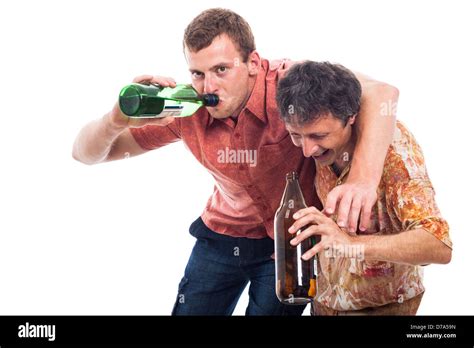 Two Funny Drunken Men With Bottle Of Alcohol Isolated On White