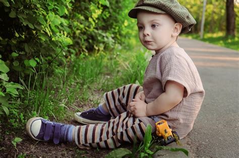 Premium Photo Cute Toddler Boy Walking Outdoors In Summer