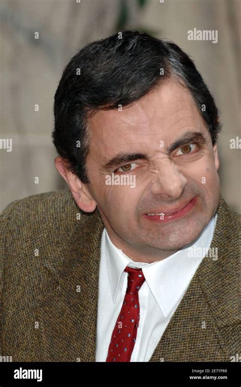 British Comedian And Actor Rowan Atkinson Poses For Pictures With A