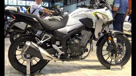 Reserves the right to make changes at any time, without notice or obligation, in colours, specifications, accessories, materials and models. EICMA HONDA CB 500X - YouTube