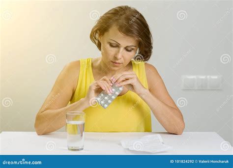 Woman Holding Pills In Her Hand Taking Pills Stock Photo Image Of