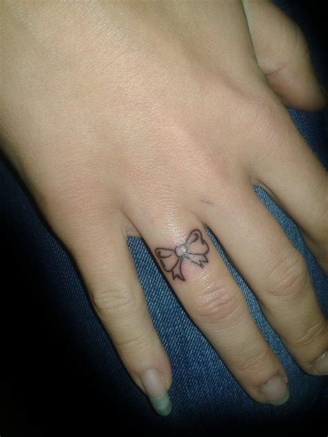 Bow Finger Tattoo Bow Tattoo Designs Hand And Finger Tattoos Tattoos