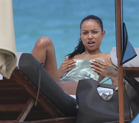 Karrueche Tran Flaunts Killer Curves In Rainbow Bikini While Hitting Up