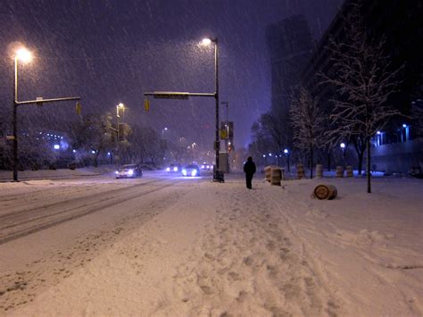 The weather in baltimore varies by season. Downtown Baltimore in a snow squall | Lars Plougmann | Flickr