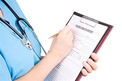 Filling Out Medical Forms Stock Photos Pictures And Royalty Free Images