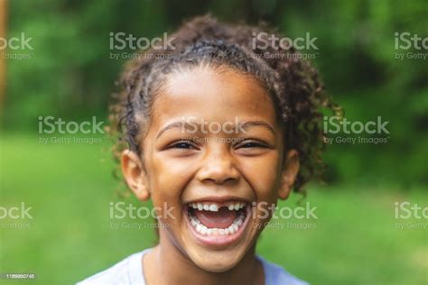 Six Year Old African American Chinese Ethnicity Girl Posing For