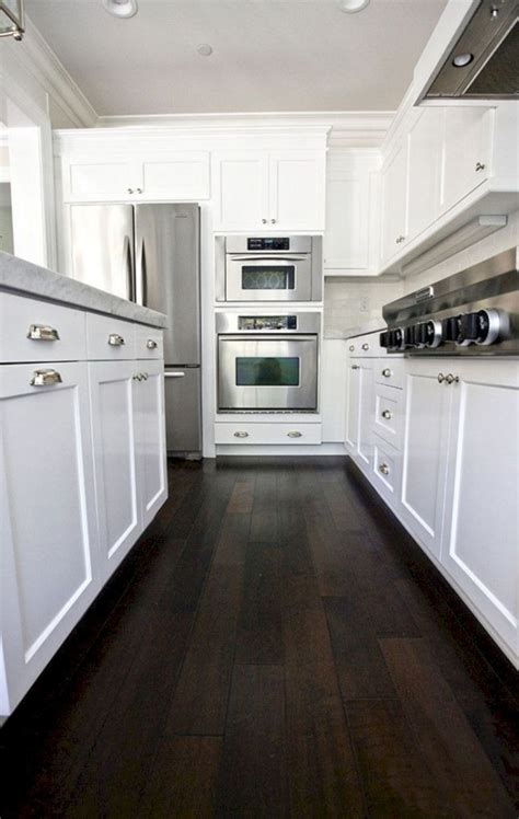 Installing solid hardwood planks, then for solid wood flooring, the general range of costs for materials alone is between $5 and $10 per square foot for standard domestic hardwoods. White Kitchens With Dark Floors 23 - Decor & Gardening ...