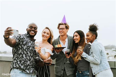 Diverse Group Of Friends Taking A Selfie At A Birthday Party Premium