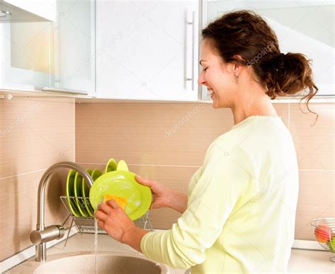 Woman Washing Dishes Kitchen Stock Photo By ©subbotina 48638613